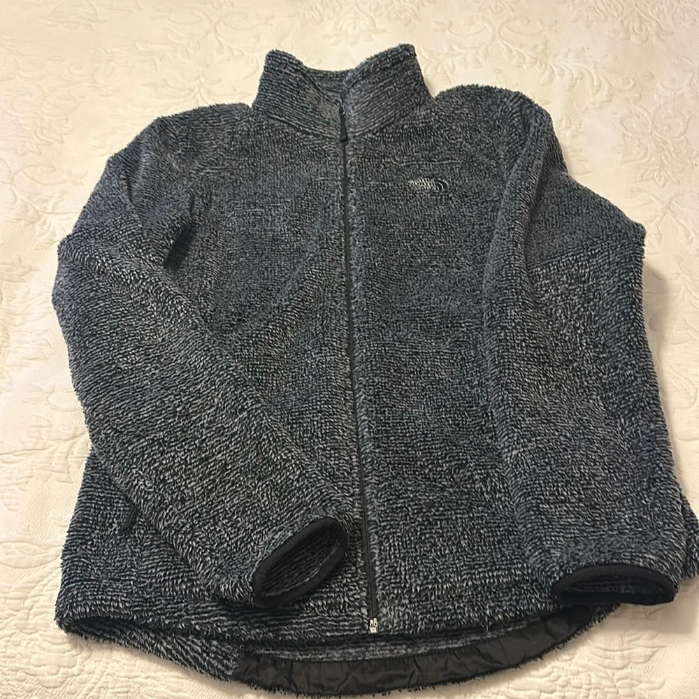 Women’s North Face size large fuzzy zip up jacket